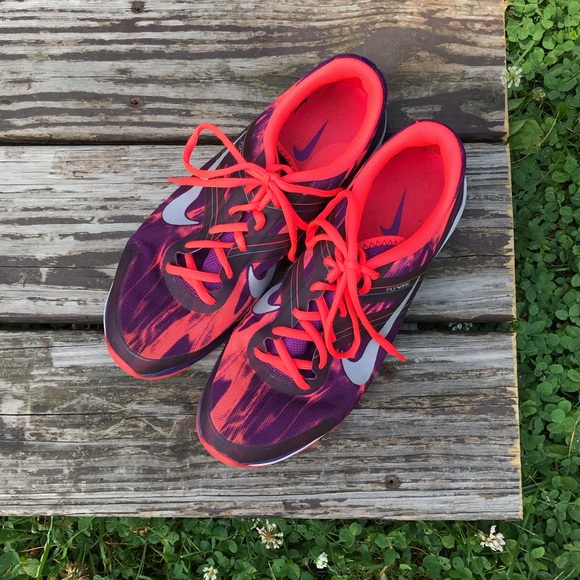 purple nike slippers